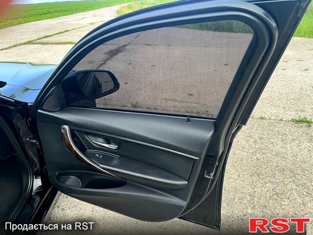 Чорний БМВ 3 Серія, об'ємом двигуна 2 л та пробігом 207 тис. км за 12100 $, фото 6 на Automoto.ua