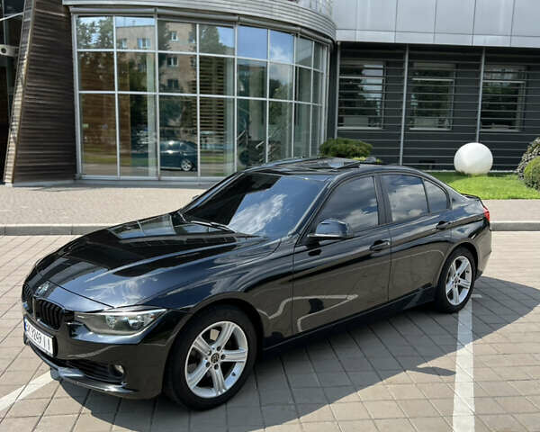 Чорний БМВ 3 Серія, об'ємом двигуна 2 л та пробігом 169 тис. км за 12500 $, фото 6 на Automoto.ua