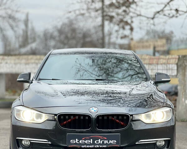 Черный БМВ 3 Серия, объемом двигателя 2 л и пробегом 231 тыс. км за 14499 $, фото 1 на Automoto.ua