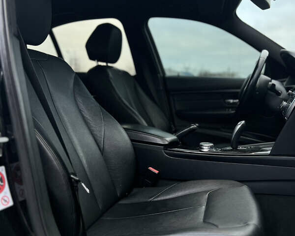 Черный БМВ 3 Серия, объемом двигателя 2 л и пробегом 231 тыс. км за 14499 $, фото 19 на Automoto.ua