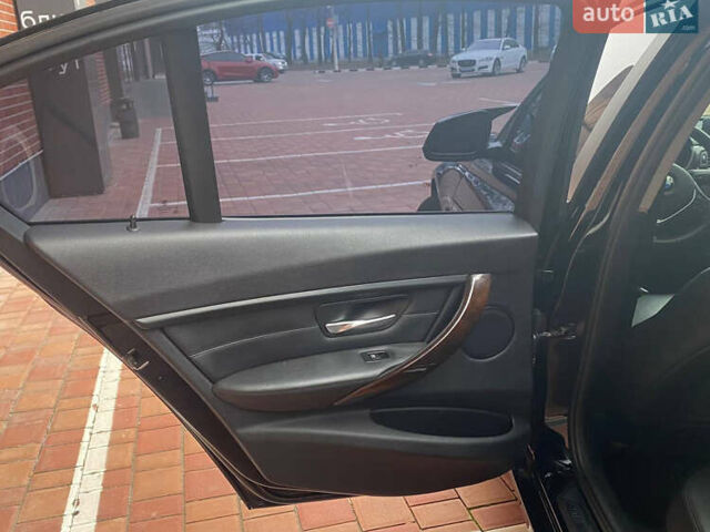 Чорний БМВ 3 Серія, об'ємом двигуна 2 л та пробігом 165 тис. км за 14700 $, фото 11 на Automoto.ua