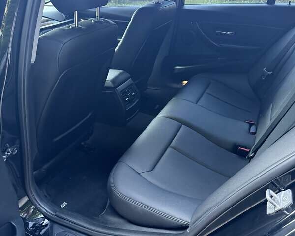 Черный БМВ 3 Серия, объемом двигателя 2 л и пробегом 175 тыс. км за 11200 $, фото 18 на Automoto.ua