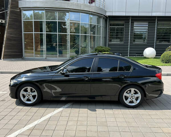 Чорний БМВ 3 Серія, об'ємом двигуна 2 л та пробігом 169 тис. км за 12500 $, фото 1 на Automoto.ua