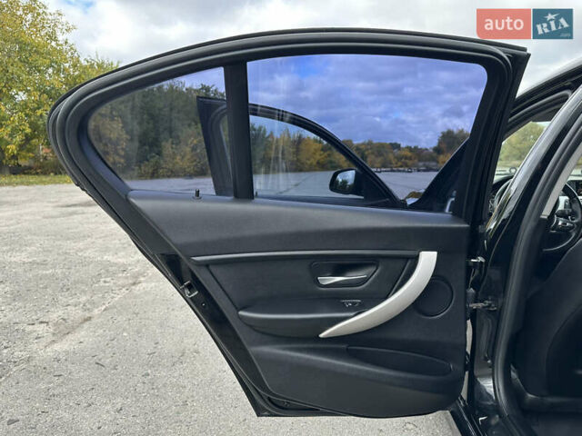 Черный БМВ 3 Серия, объемом двигателя 2 л и пробегом 77 тыс. км за 13999 $, фото 18 на Automoto.ua