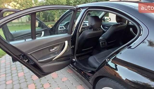 Чорний БМВ 3 Серія, об'ємом двигуна 2 л та пробігом 151 тис. км за 14700 $, фото 14 на Automoto.ua