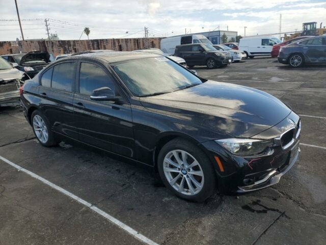 Черный БМВ 3 Серия, объемом двигателя 2 л и пробегом 225 тыс. км за 9900 $, фото 2 на Automoto.ua