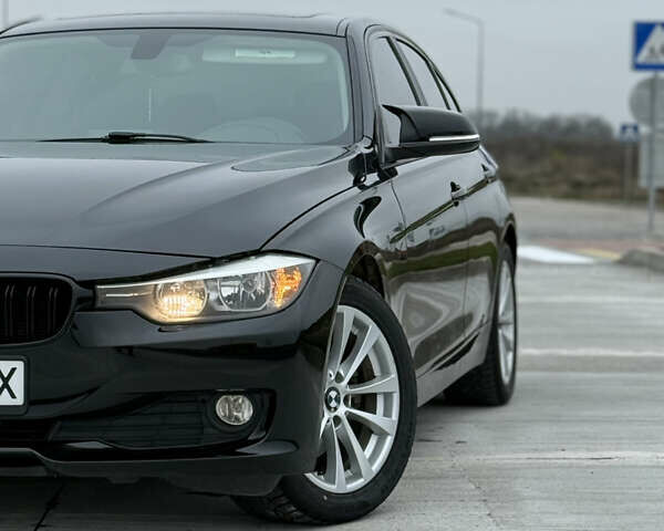 Черный БМВ 3 Серия, объемом двигателя 2 л и пробегом 189 тыс. км за 12500 $, фото 4 на Automoto.ua