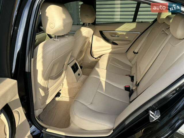 Чорний БМВ 3 Серія, об'ємом двигуна 2 л та пробігом 143 тис. км за 16700 $, фото 13 на Automoto.ua