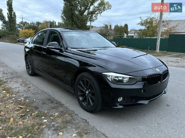 Черный БМВ 3 Серия, объемом двигателя 2 л и пробегом 128 тыс. км за 12900 $, фото 3 на Automoto.ua