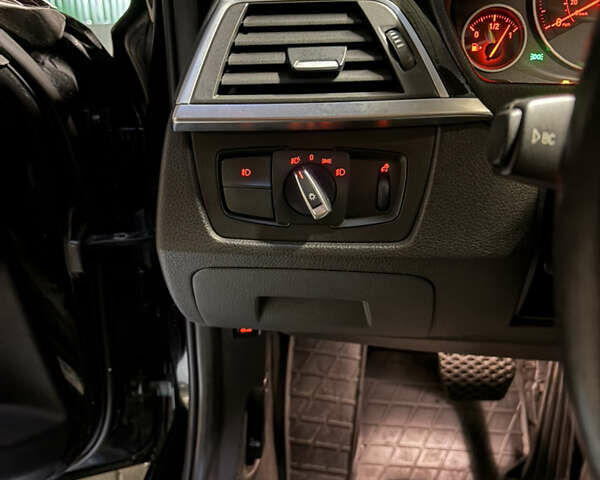 Чорний БМВ 3 Серія, об'ємом двигуна 2 л та пробігом 149 тис. км за 16100 $, фото 14 на Automoto.ua