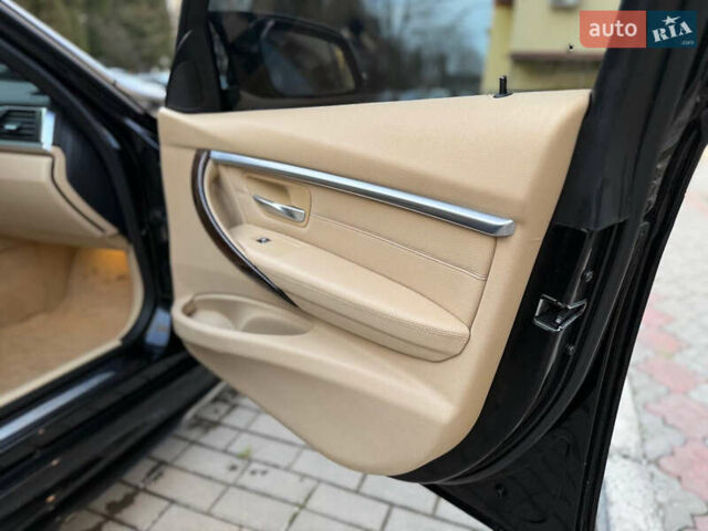 Чорний БМВ 3 Серія, об'ємом двигуна 2 л та пробігом 240 тис. км за 13300 $, фото 57 на Automoto.ua