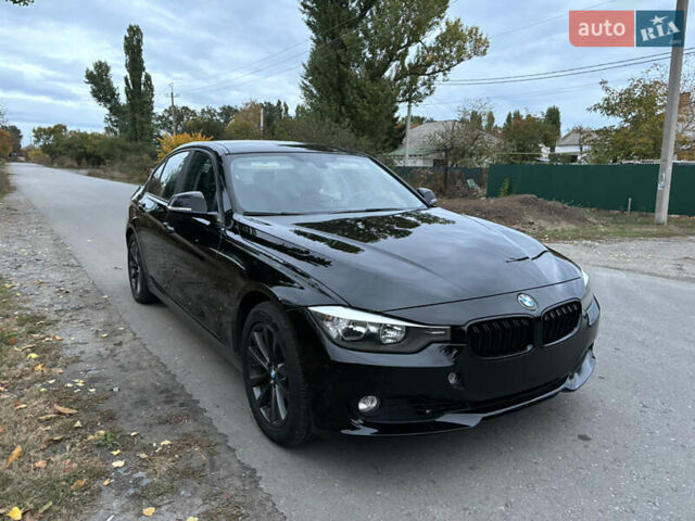 Черный БМВ 3 Серия, объемом двигателя 2 л и пробегом 128 тыс. км за 12900 $, фото 6 на Automoto.ua
