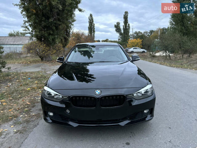Черный БМВ 3 Серия, объемом двигателя 2 л и пробегом 128 тыс. км за 12900 $, фото 1 на Automoto.ua