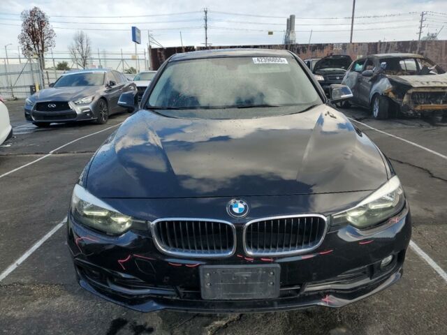 Черный БМВ 3 Серия, объемом двигателя 2 л и пробегом 225 тыс. км за 9900 $, фото 1 на Automoto.ua