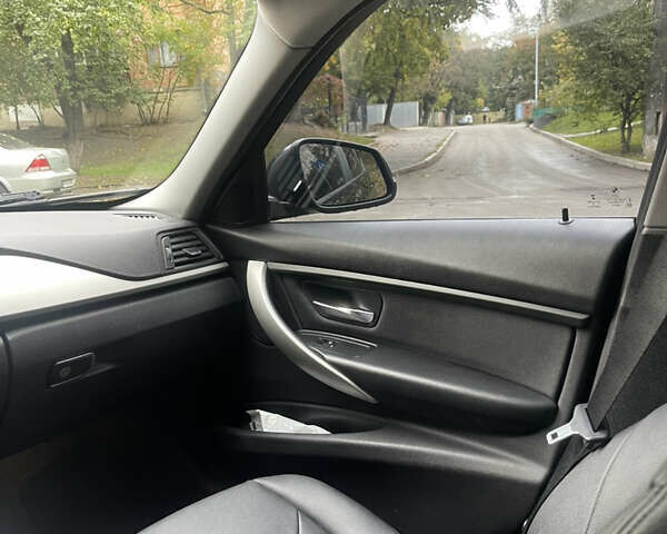 Чорний БМВ 3 Серія, об'ємом двигуна 2 л та пробігом 152 тис. км за 19000 $, фото 6 на Automoto.ua