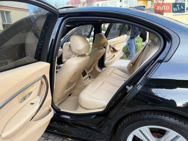 Чорний БМВ 3 Серія, об'ємом двигуна 2 л та пробігом 240 тис. км за 13300 $, фото 69 на Automoto.ua