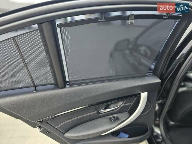 Чорний БМВ 3 Серія, об'ємом двигуна 2 л та пробігом 206 тис. км за 14800 $, фото 23 на Automoto.ua