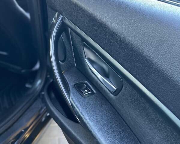 Черный БМВ 3 Серия, объемом двигателя 2 л и пробегом 197 тыс. км за 12800 $, фото 18 на Automoto.ua