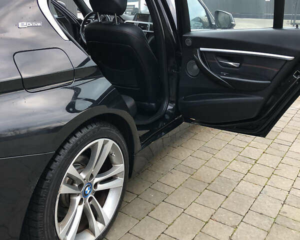 Чорний БМВ 3 Серія, об'ємом двигуна 2 л та пробігом 179 тис. км за 14600 $, фото 11 на Automoto.ua