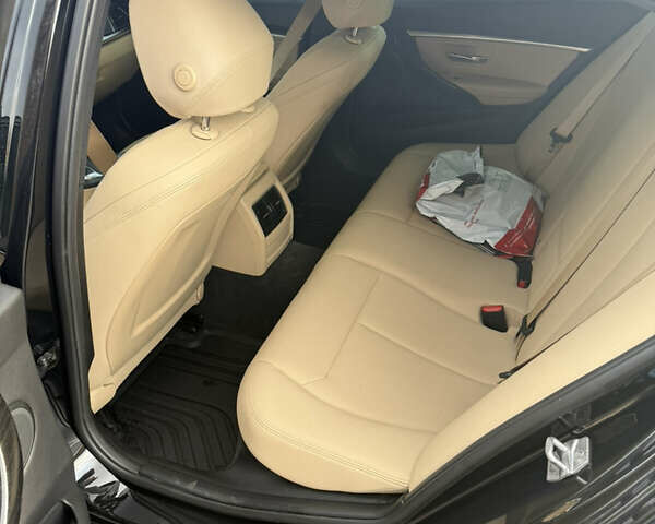 Чорний БМВ 3 Серія, об'ємом двигуна 2 л та пробігом 115 тис. км за 18000 $, фото 12 на Automoto.ua