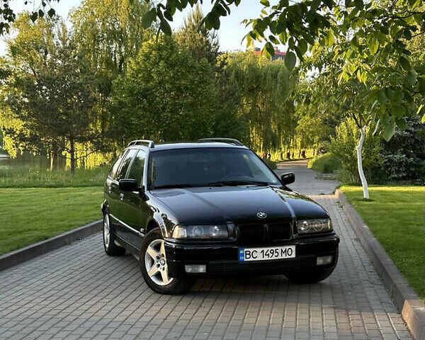 Черный БМВ 3 Серия, объемом двигателя 1.8 л и пробегом 320 тыс. км за 4200 $, фото 8 на Automoto.ua