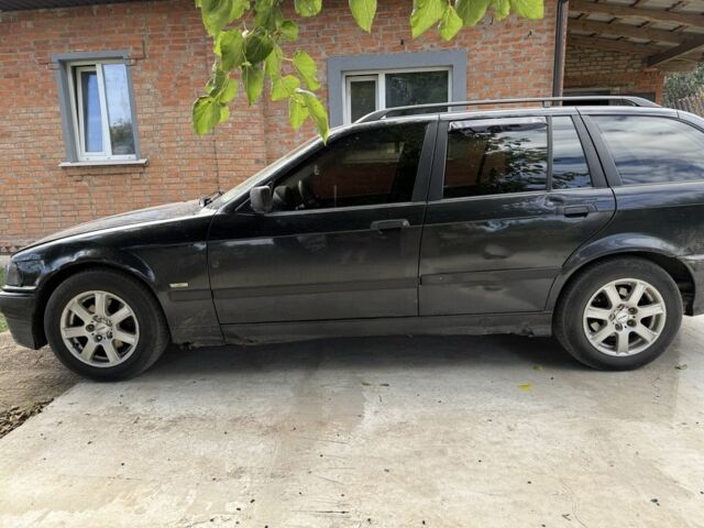 Черный БМВ 3 Серия, объемом двигателя 1.6 л и пробегом 465 тыс. км за 1550 $, фото 2 на Automoto.ua