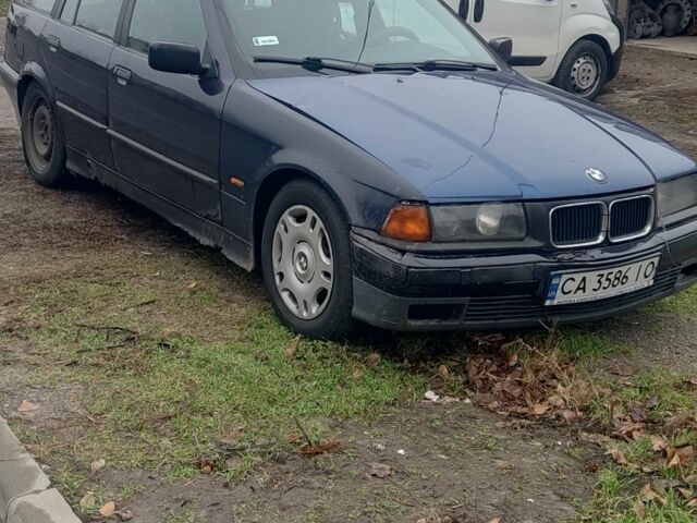 Черный БМВ 3 Серия, объемом двигателя 1.7 л и пробегом 370 тыс. км за 1600 $, фото 1 на Automoto.ua