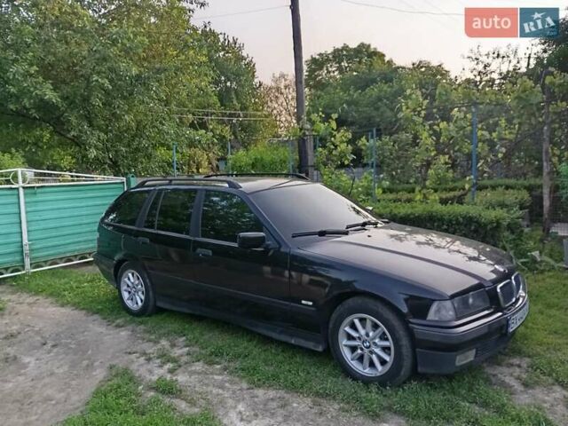 Чорний БМВ 3 Серія, об'ємом двигуна 1.7 л та пробігом 303 тис. км за 3700 $, фото 2 на Automoto.ua