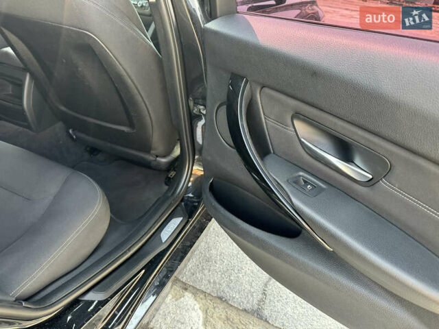 Черный БМВ 3 Серия, объемом двигателя 2 л и пробегом 330 тыс. км за 10999 $, фото 38 на Automoto.ua