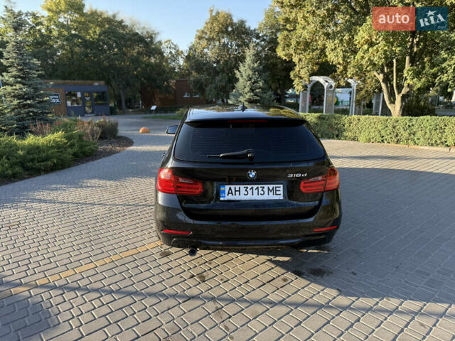 Черный БМВ 3 Серия, объемом двигателя 2 л и пробегом 330 тыс. км за 10999 $, фото 5 на Automoto.ua