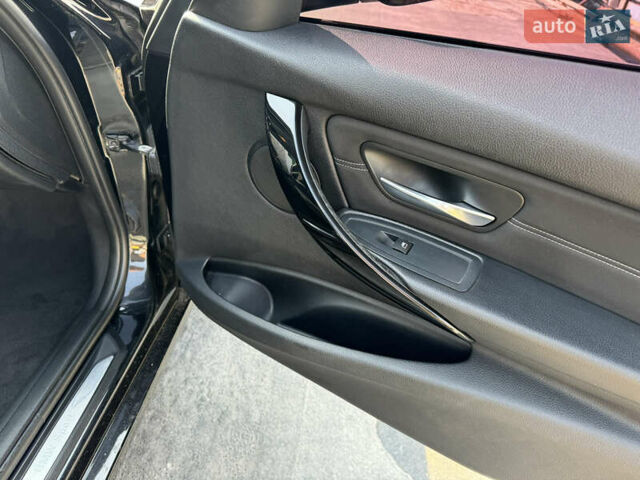 Черный БМВ 3 Серия, объемом двигателя 2 л и пробегом 330 тыс. км за 10999 $, фото 37 на Automoto.ua