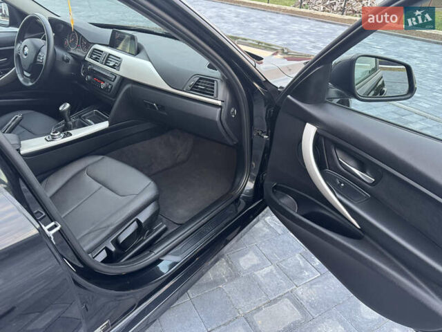 Чорний БМВ 3 Серія, об'ємом двигуна 2 л та пробігом 266 тис. км за 13700 $, фото 23 на Automoto.ua