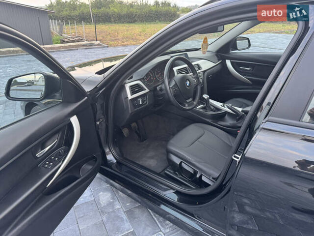 Чорний БМВ 3 Серія, об'ємом двигуна 2 л та пробігом 266 тис. км за 13700 $, фото 12 на Automoto.ua