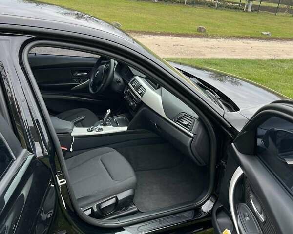 Чорний БМВ 3 Серія, об'ємом двигуна 2 л та пробігом 292 тис. км за 14700 $, фото 7 на Automoto.ua