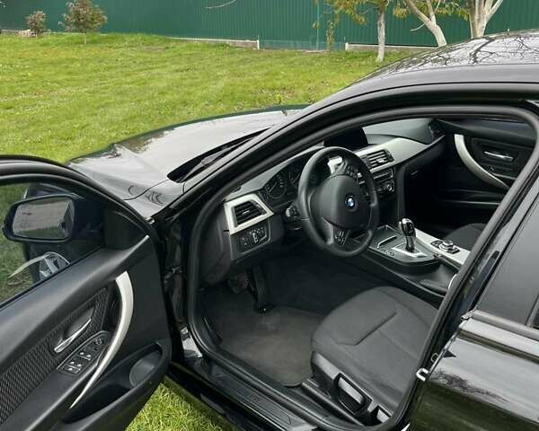 Чорний БМВ 3 Серія, об'ємом двигуна 2 л та пробігом 292 тис. км за 14700 $, фото 5 на Automoto.ua