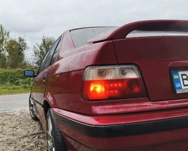 Червоний БМВ 3 Серія, об'ємом двигуна 2 л та пробігом 300 тис. км за 4600 $, фото 36 на Automoto.ua