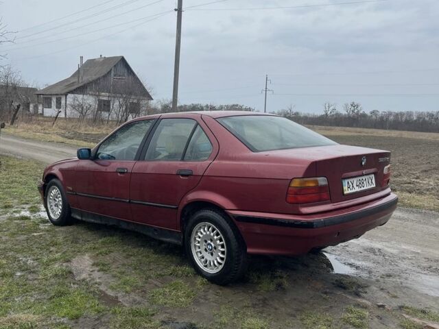 Красный БМВ 3 Серия, объемом двигателя 2.5 л и пробегом 261 тыс. км за 2200 $, фото 1 на Automoto.ua
