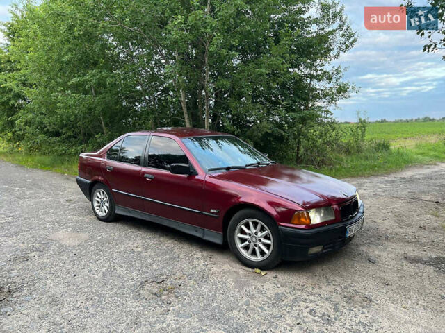 Красный БМВ 3 Серия, объемом двигателя 2.5 л и пробегом 400 тыс. км за 2600 $, фото 3 на Automoto.ua