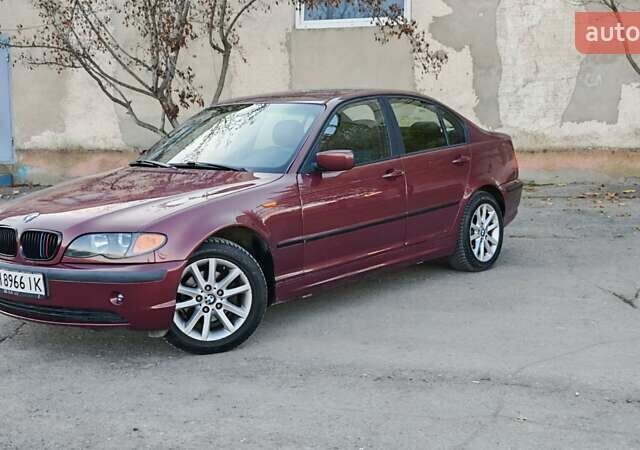Красный БМВ 3 Серия, объемом двигателя 1.8 л и пробегом 260 тыс. км за 4999 $, фото 1 на Automoto.ua