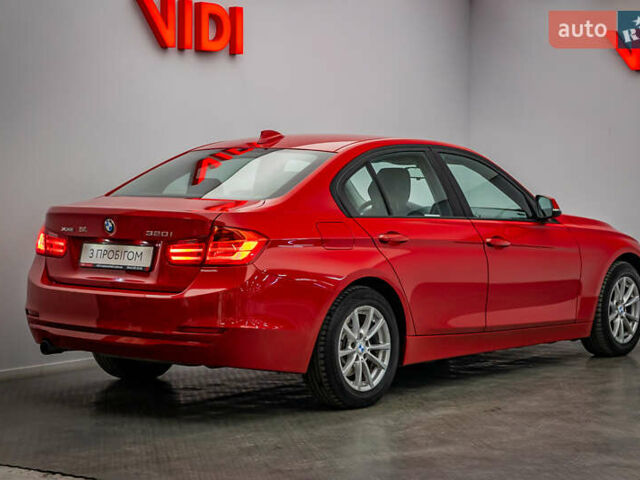 Красный БМВ 3 Серия, объемом двигателя 2 л и пробегом 124 тыс. км за 14705 $, фото 1 на Automoto.ua