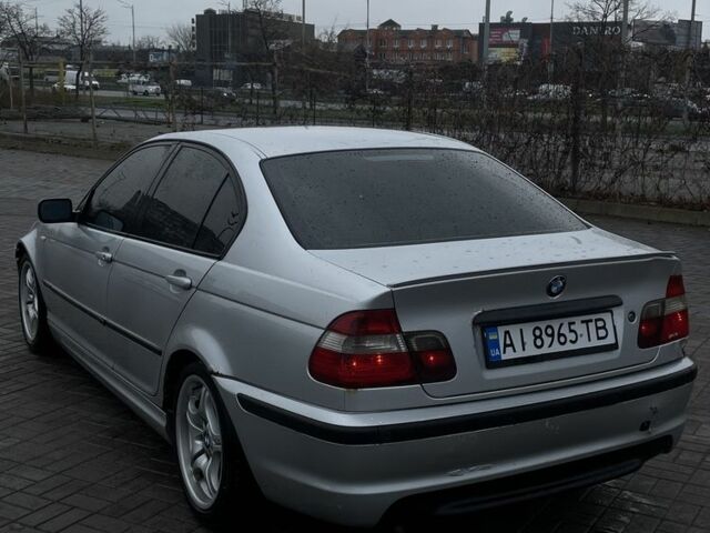 Серый БМВ 3 Серия, объемом двигателя 2 л и пробегом 398 тыс. км за 3499 $, фото 4 на Automoto.ua
