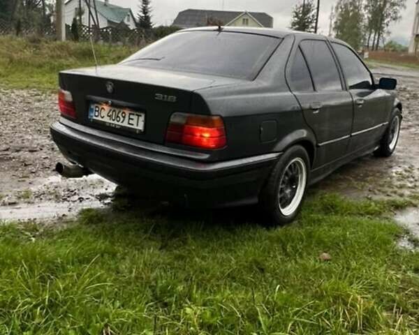 Сірий БМВ 3 Серія, об'ємом двигуна 1.8 л та пробігом 310 тис. км за 2300 $, фото 6 на Automoto.ua