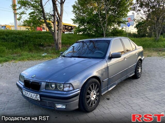 Серый БМВ 3 Серия, объемом двигателя 2.5 л и пробегом 589 тыс. км за 1599 $, фото 1 на Automoto.ua