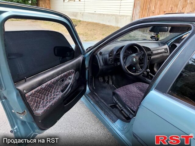 Серый БМВ 3 Серия, объемом двигателя 1.8 л и пробегом 300 тыс. км за 3000 $, фото 7 на Automoto.ua