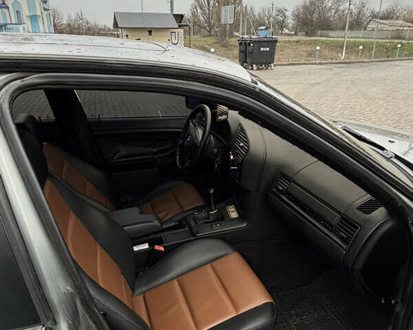 Серый БМВ 3 Серия, объемом двигателя 2 л и пробегом 360 тыс. км за 2800 $, фото 5 на Automoto.ua