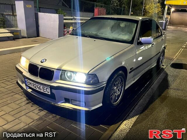 Серый БМВ 3 Серия, объемом двигателя 2.5 л и пробегом 328 тыс. км за 4000 $, фото 1 на Automoto.ua