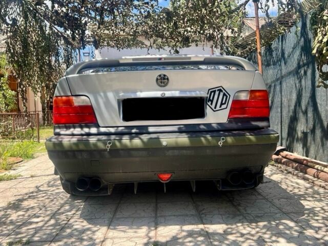 Серый БМВ 3 Серия, объемом двигателя 4 л и пробегом 10 тыс. км за 10000 $, фото 1 на Automoto.ua