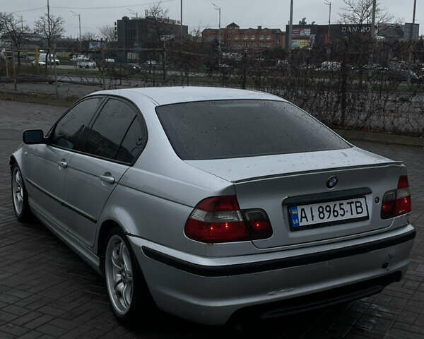 Серый БМВ 3 Серия, объемом двигателя 2 л и пробегом 400 тыс. км за 3399 $, фото 6 на Automoto.ua