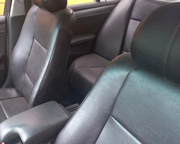 Серый БМВ 3 Серия, объемом двигателя 2 л и пробегом 234 тыс. км за 5900 $, фото 3 на Automoto.ua