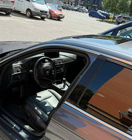 Серый БМВ 3 Серия, объемом двигателя 2 л и пробегом 209 тыс. км за 14100 $, фото 6 на Automoto.ua